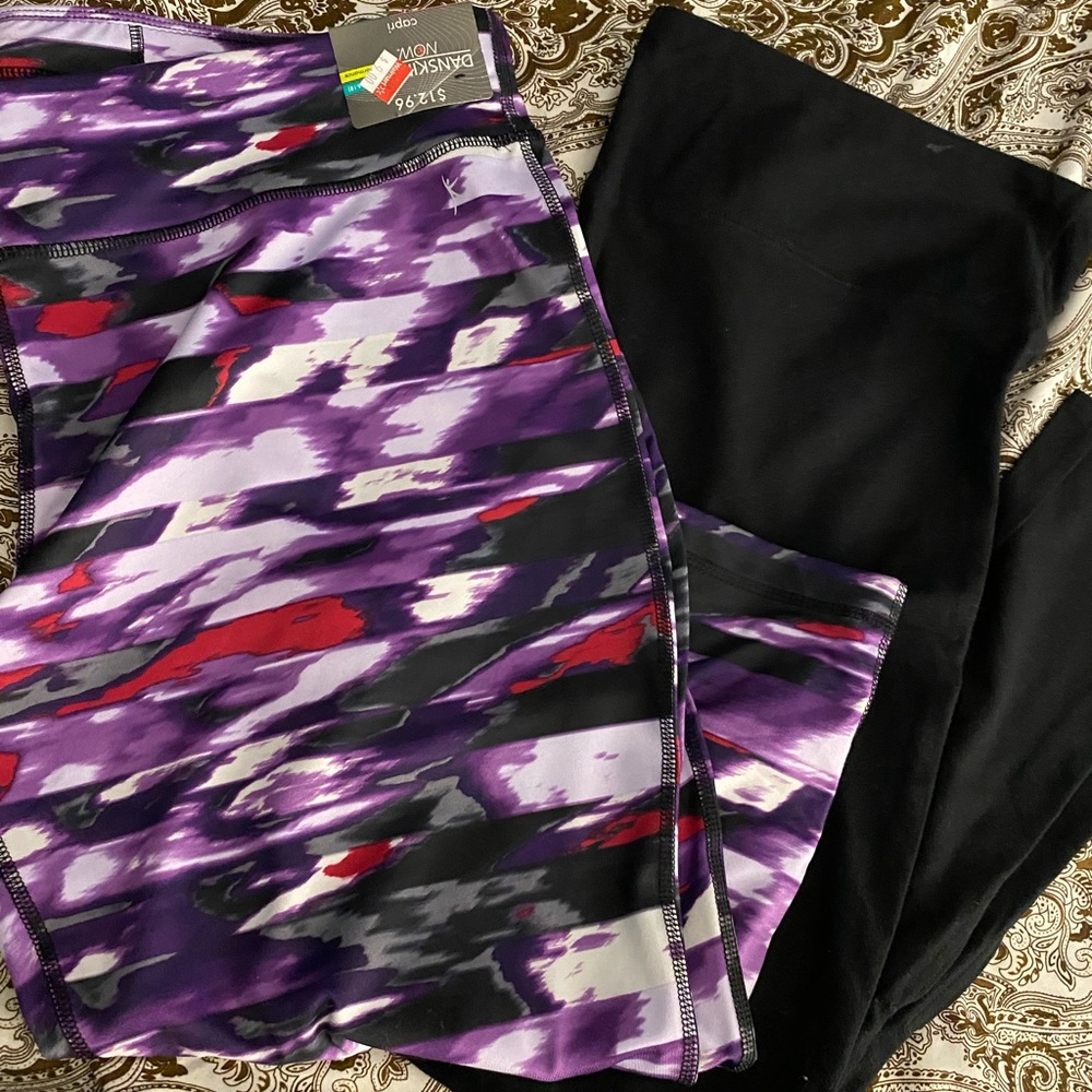 Two pairs of leggings/workout pants.